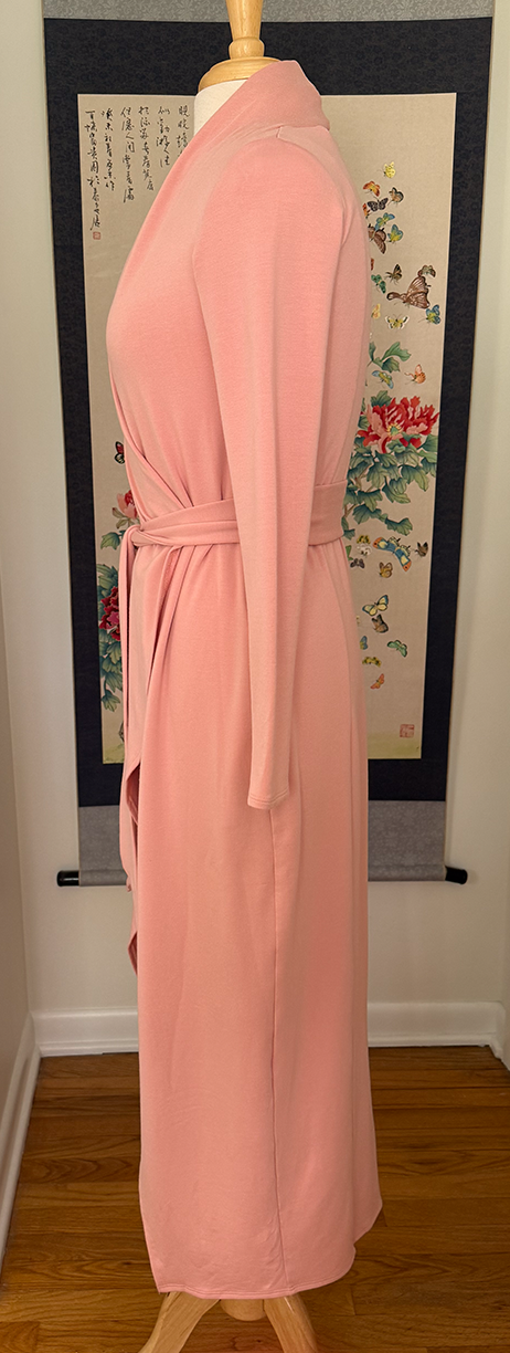 Pink long knit robe on mannequin side view