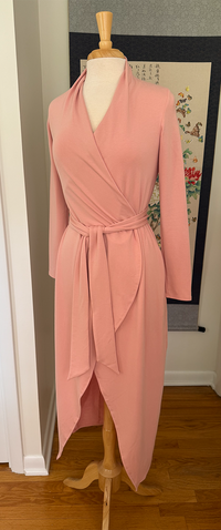 Pink long knit robe on mannequin angled view