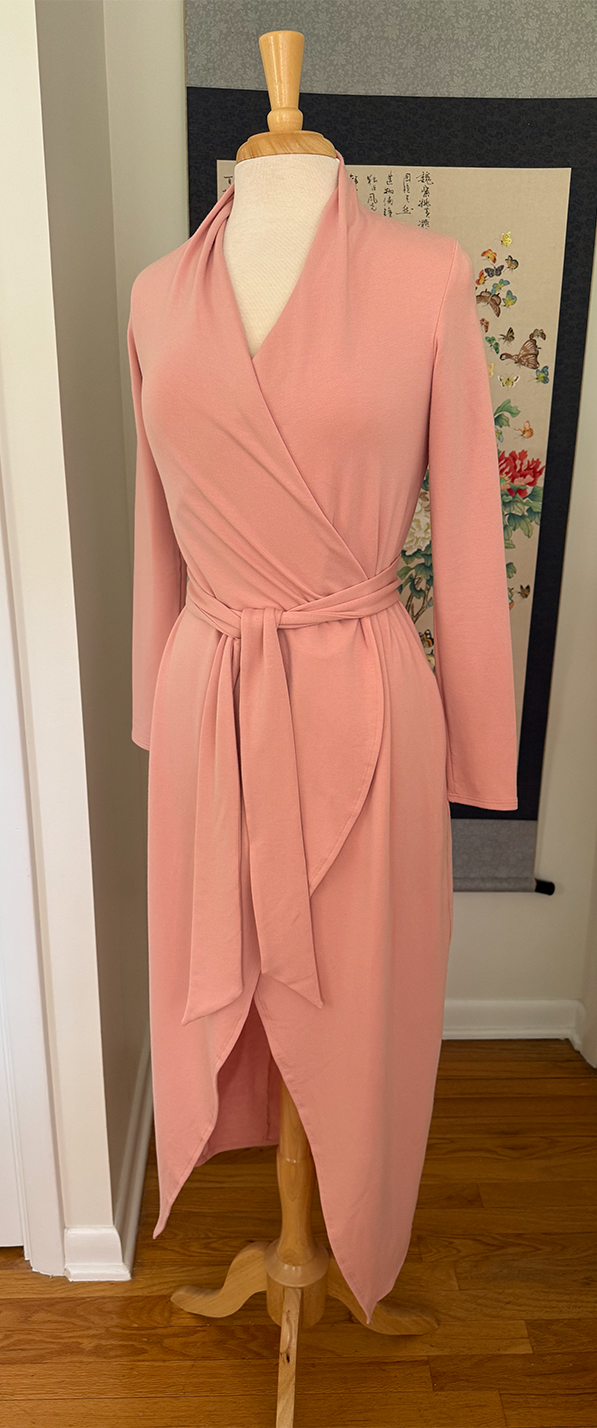 Pink long knit robe on mannequin angled view
