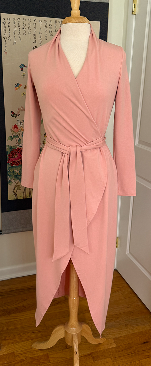 Pink long knit robe on mannequin front view