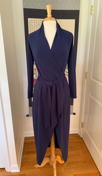 The front view of a blue long knit robe